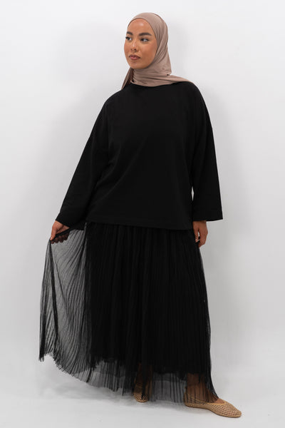 Jupe en tulle Mayla Couture, légère et aérienne, idéale pour un look mastour et féminin au quotidien.